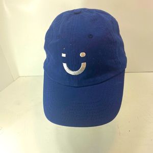 Blue ball cap with smiley face